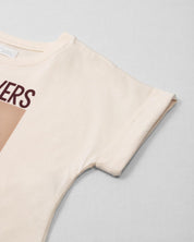 Camiseta crema con estampado para niña