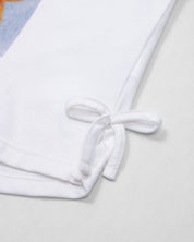 Blusa blanca manga sisa con estampado para niña