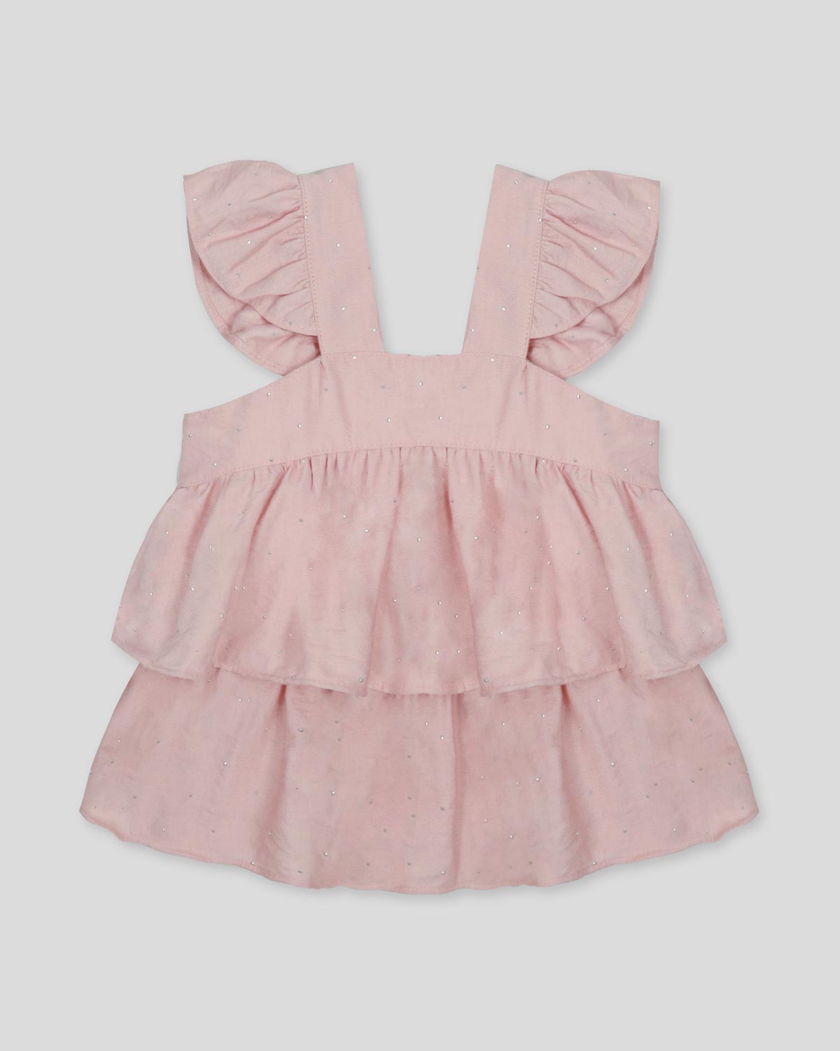 Blusa rosa con brillos y tiras con boleritos para niña