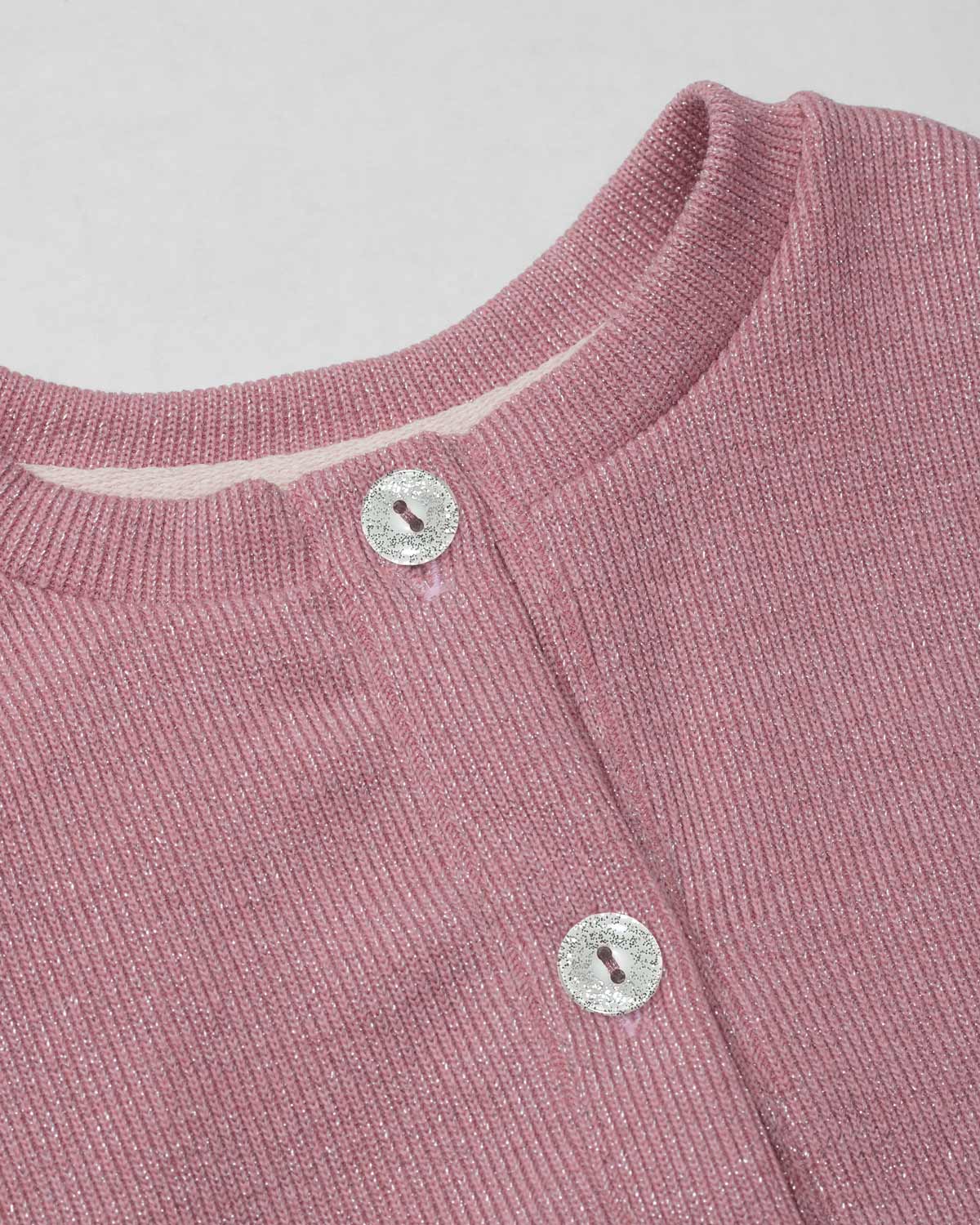 Saco palo de rosa con brillos para niña