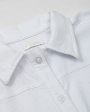 Camisa blanca de botones manga corta para niña