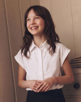 Camisa blanca de botones manga corta para niña