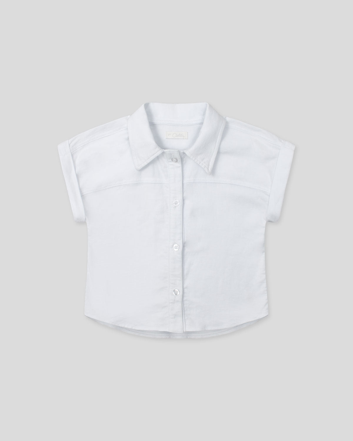 Camisa blanca de botones manga corta para niña