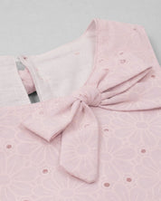 Blusa tela hoja rota rosa con moños para niña