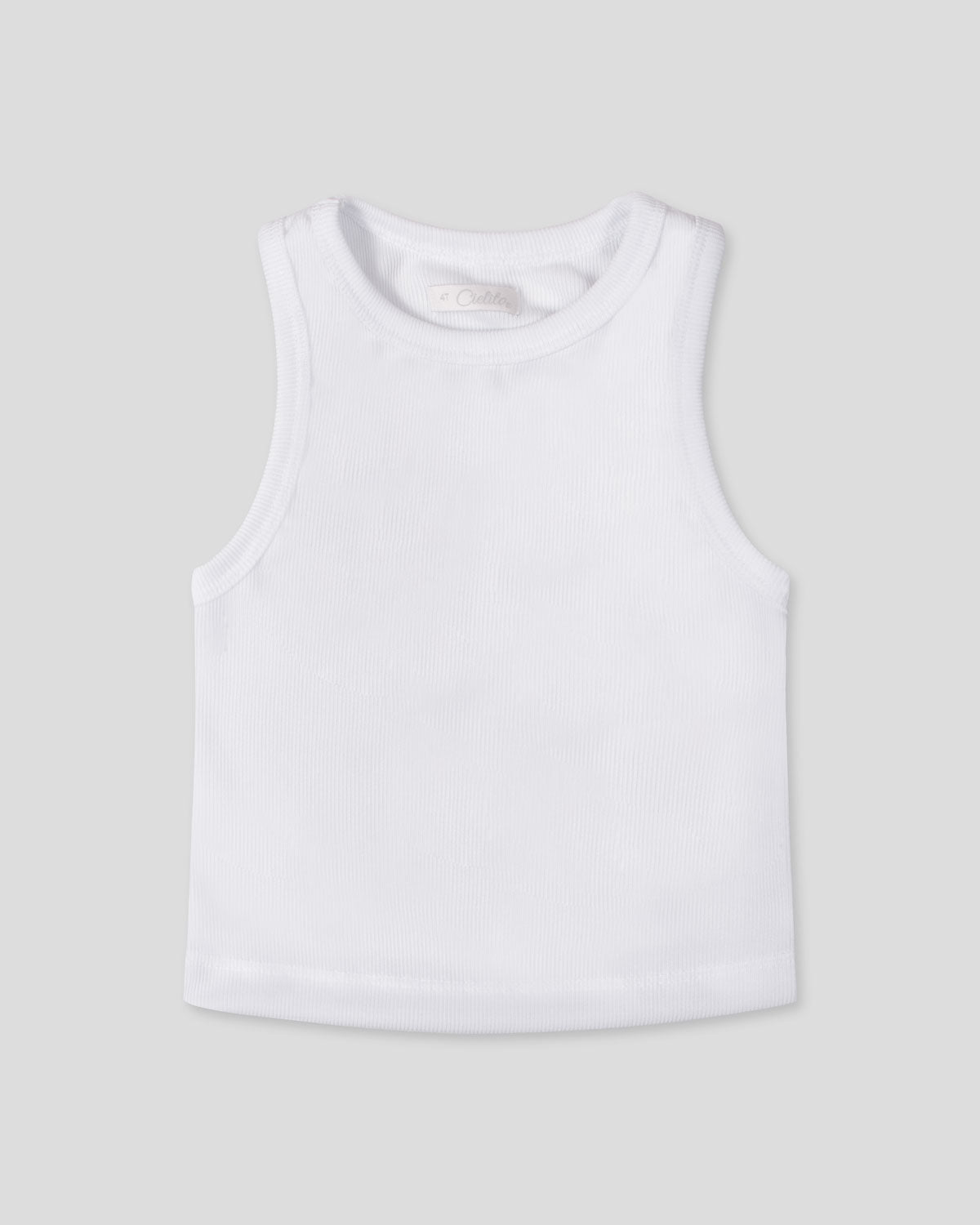 Blusa básica blanca de tiras para niña