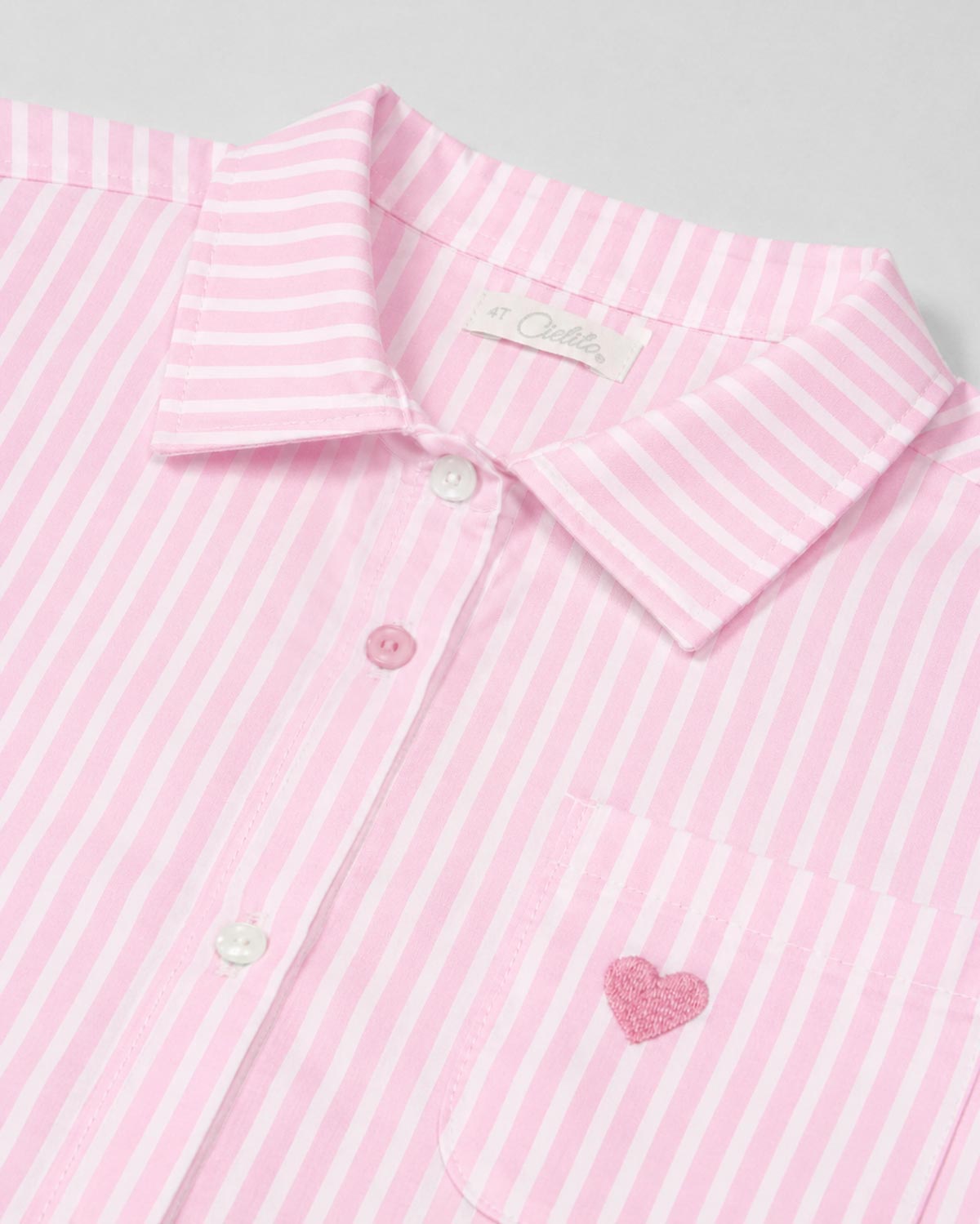 Camisa de rayas rosa con corazón bordado para niña