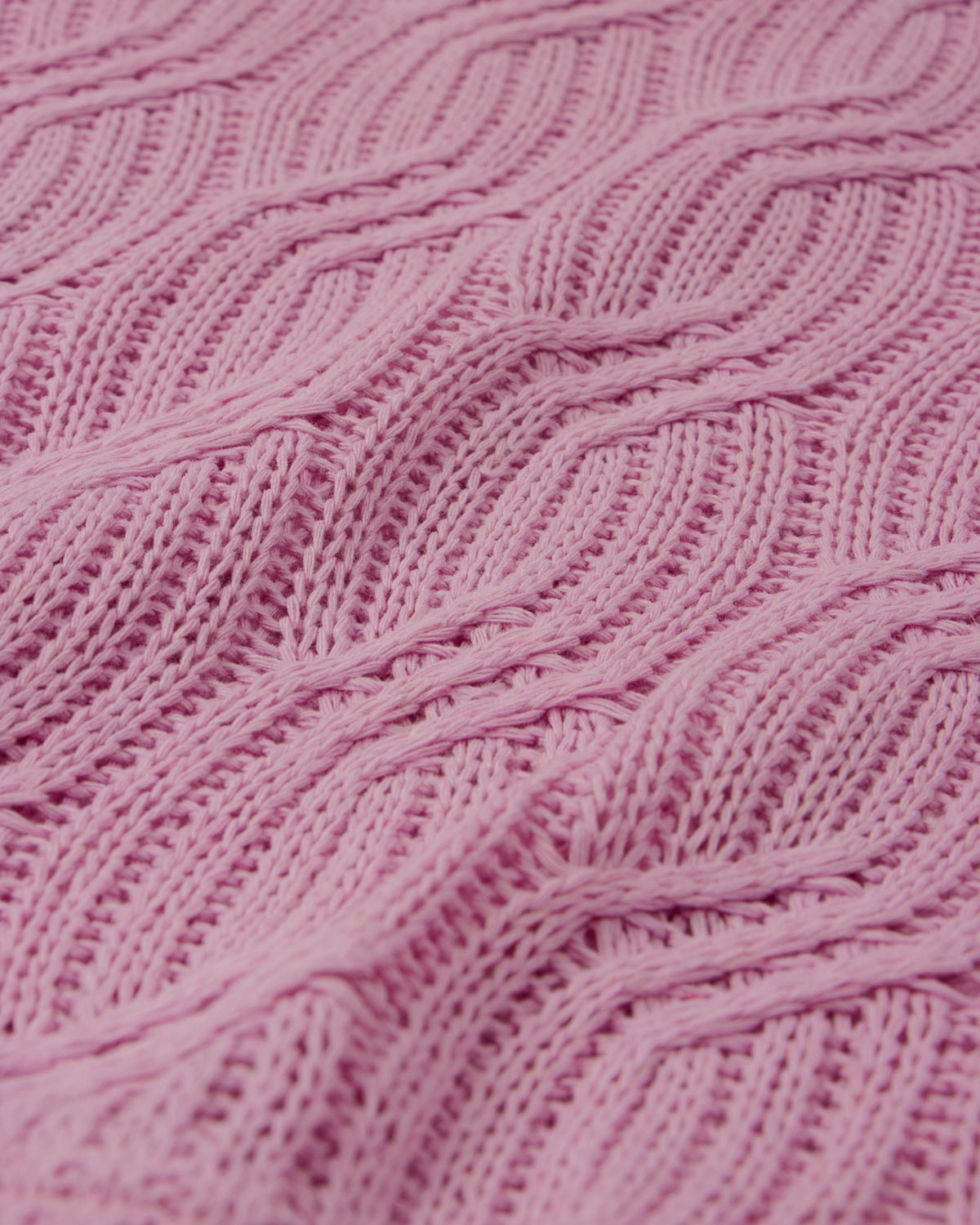 Saco en tejido trenzado rosa para niña