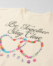 Camiseta cruda estampada para niña