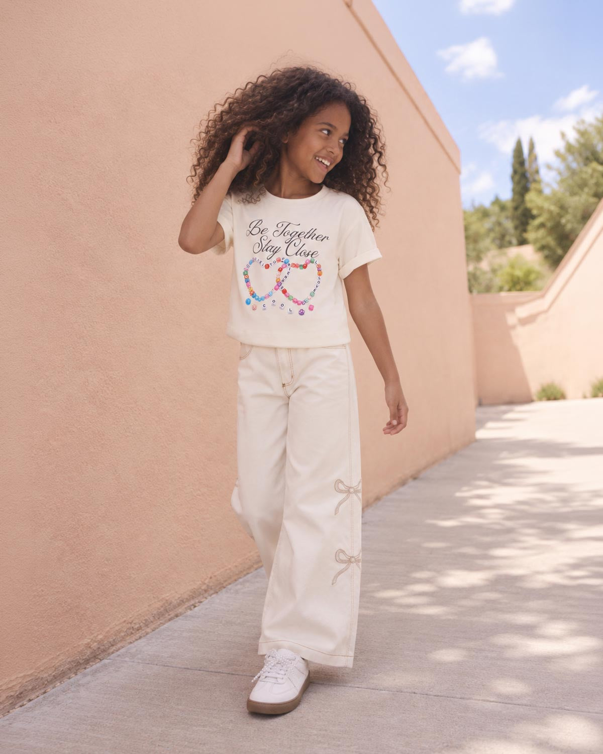 Camiseta cruda estampada para niña