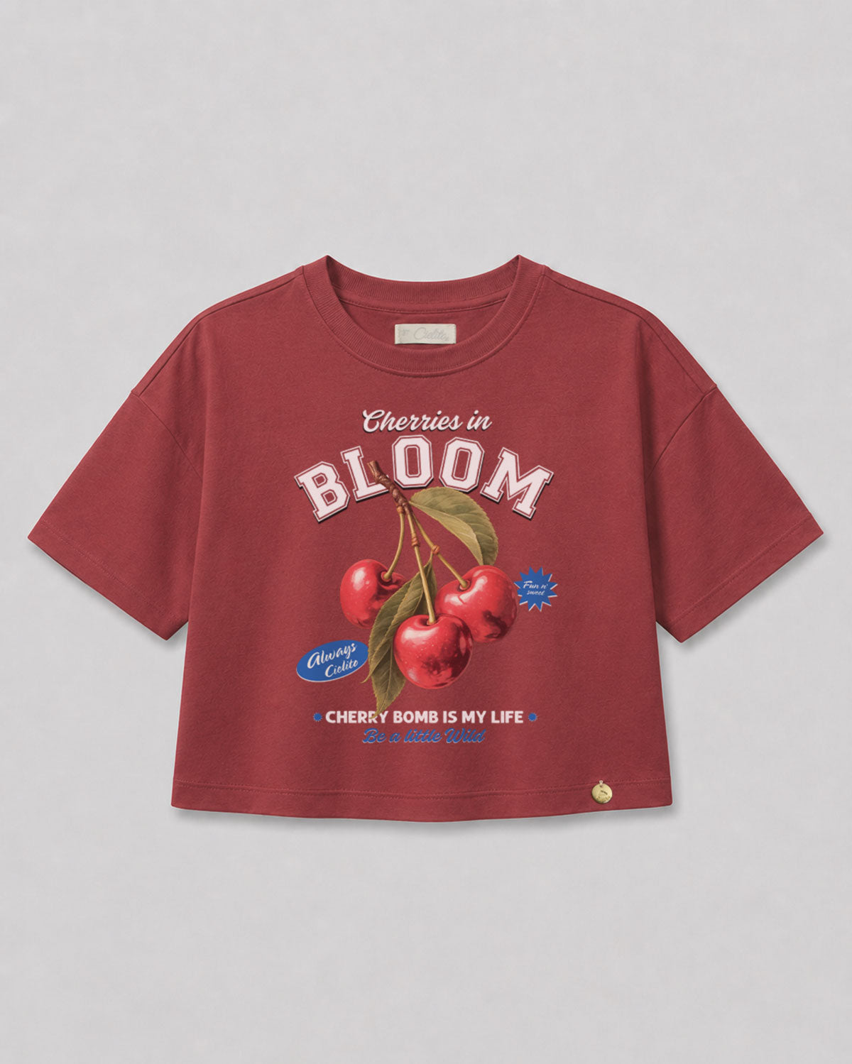 Camiseta roja con estampado de cerezas para niña