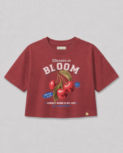 Camiseta roja con estampado de cerezas para niña