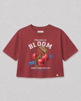 Camiseta roja con estampado de cerezas para niña