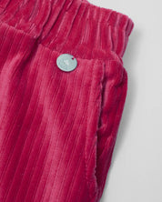 Pantalón fucsia resortado en tejido rib para niña