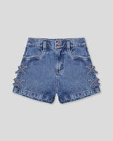 Short denim con moñitos en costados para niña