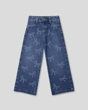 Jean denim marine fit con diseño de moños para niña