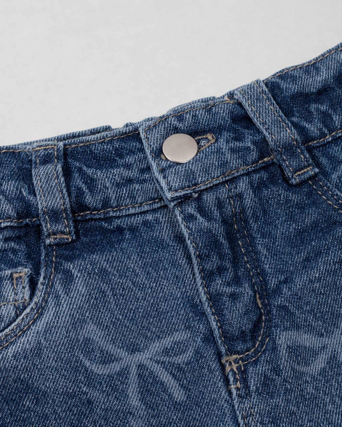 Short denim con diseño de moños para niña