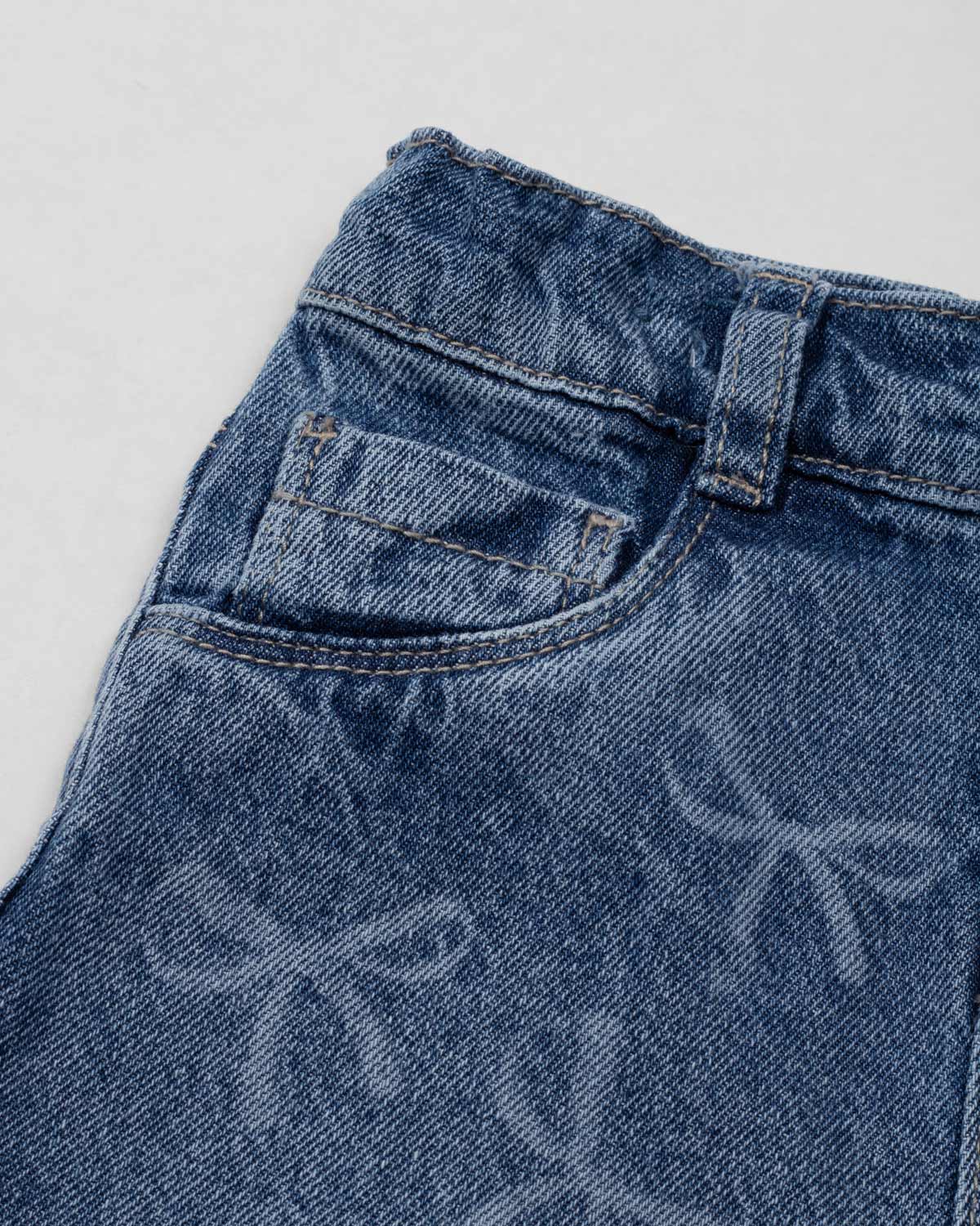 Short denim con diseño de moños para niña