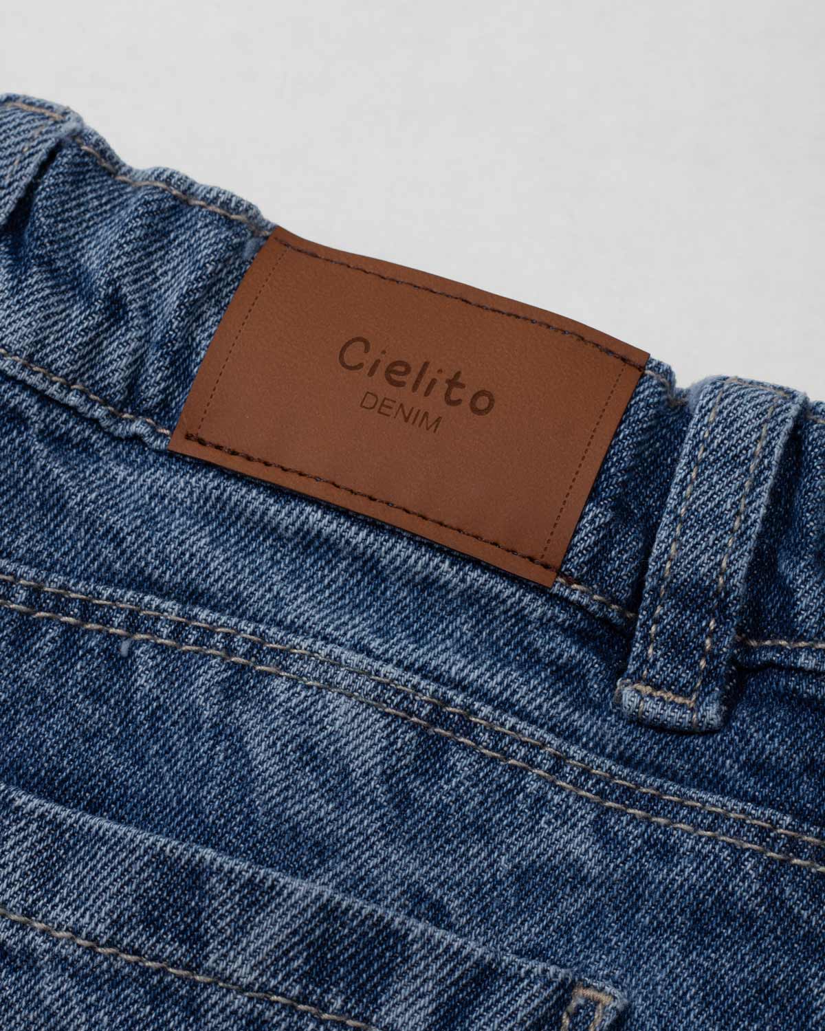 Short denim con diseño de moños para niña