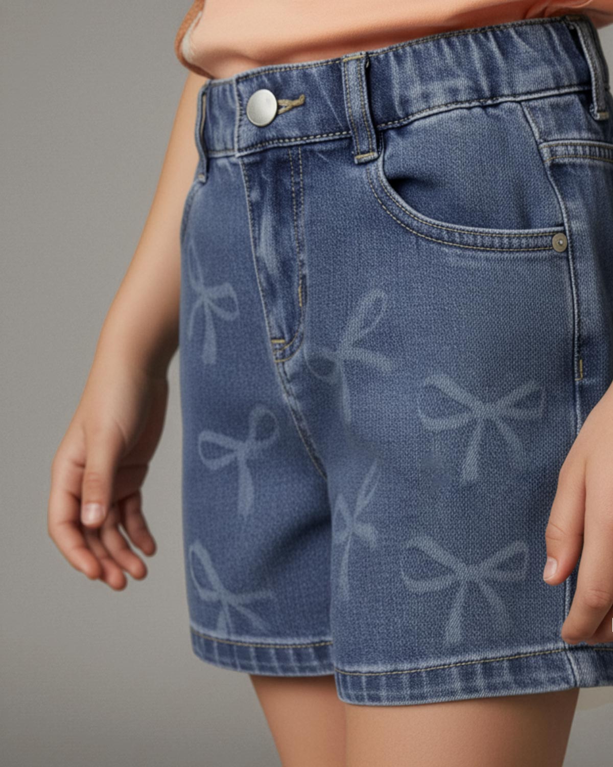 Short denim con diseño de moños para niña