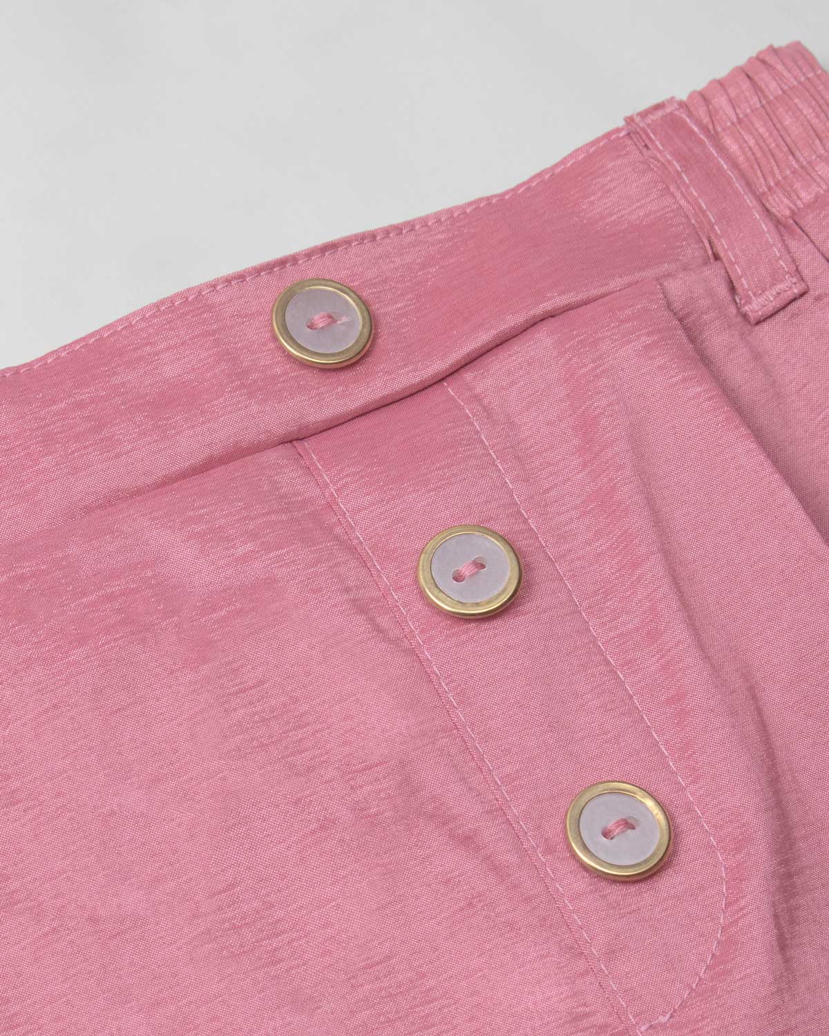 Short rosa brillante para niña