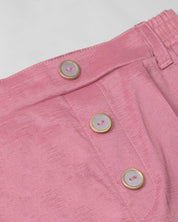 Short rosa brillante para niña