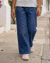 Jean denim marine fit con aplique brillante de estrellas para niña