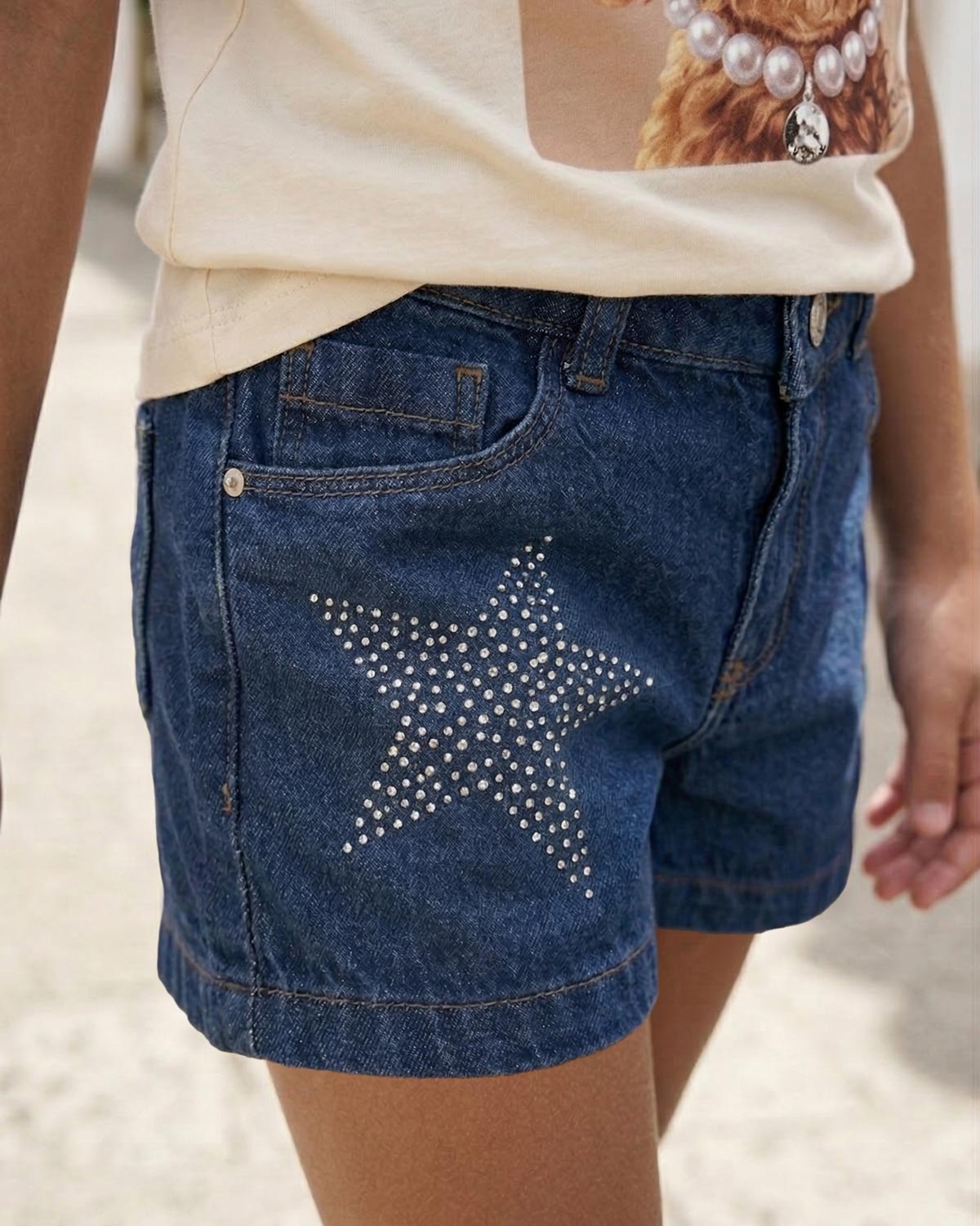 Short denim con aplique brillante de estrellas para niña