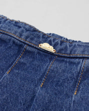 Falda short con pliegues para niña