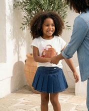 Falda short con pliegues para niña