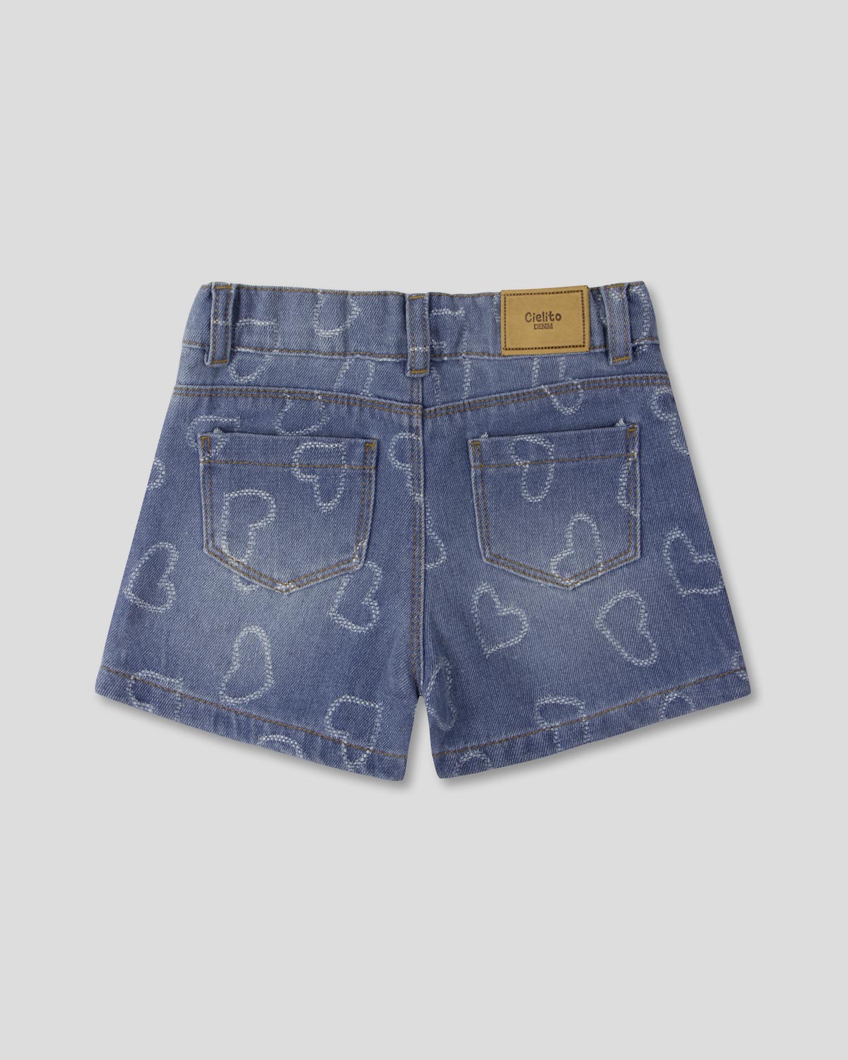 Short denim con diseño de corazones para niña