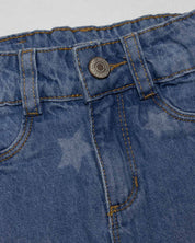 Jean denim marine fit con estrellas para niña