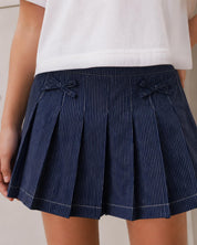 Falda short denim de rayas con moñitos para niña