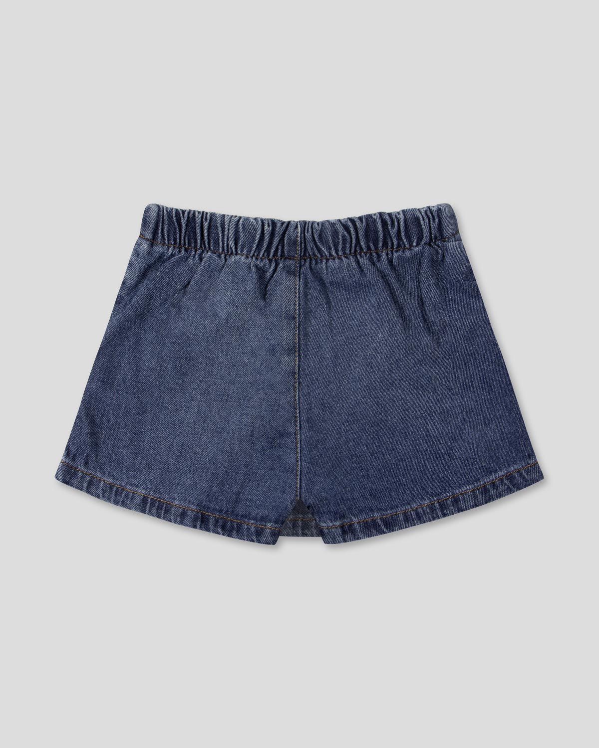 Falda short de pliegues para niña