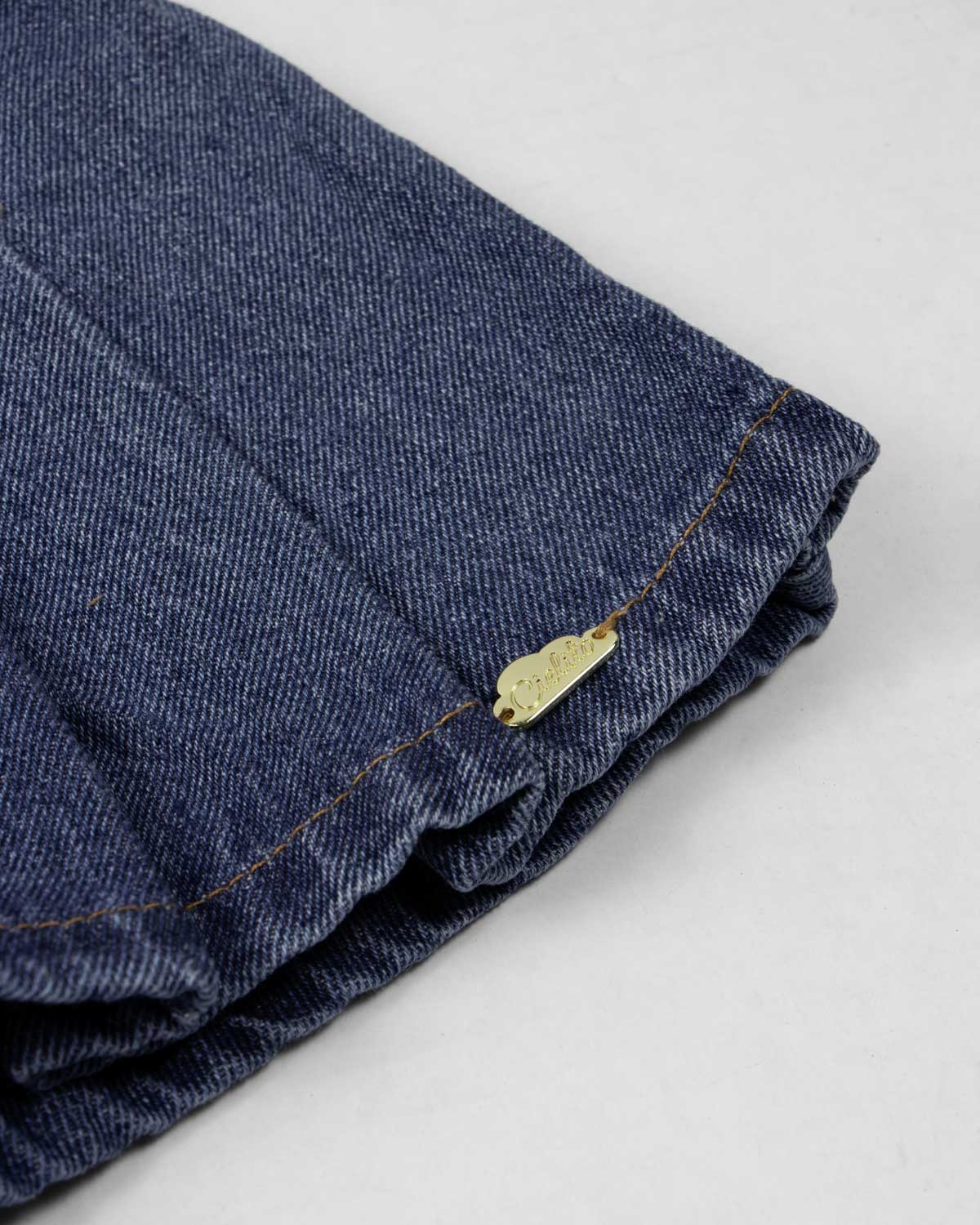 Falda short de pliegues para niña