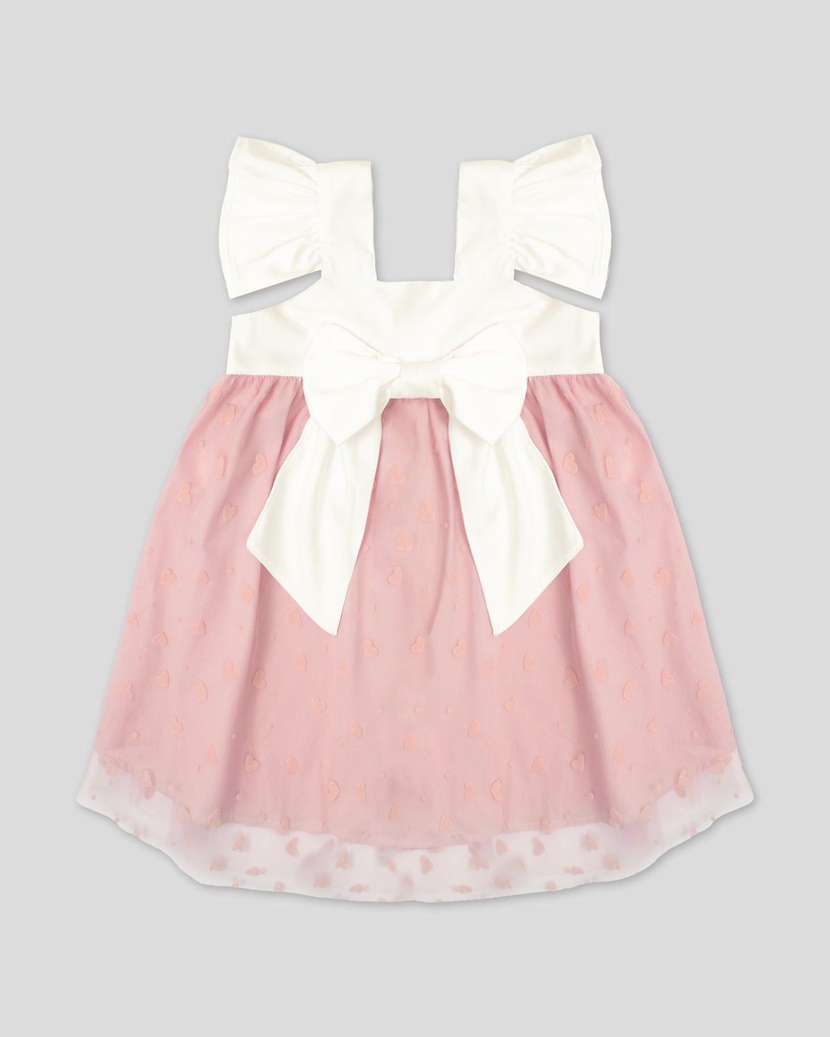 Vestido en satín blanco con moño y tul rosa con corazones para niña