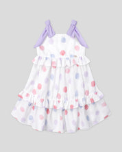 Vestido en lino estampado con lunares y tiras con moños lila para niña