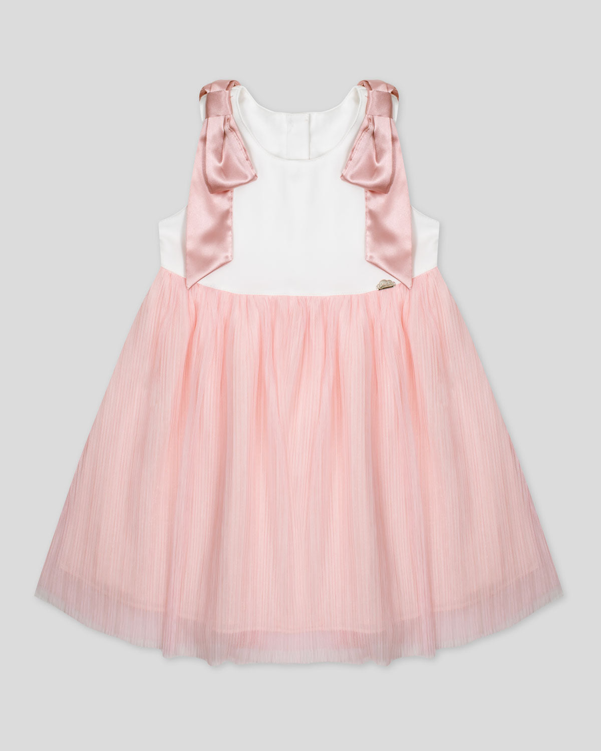 Vestido en satín blanco con moños en hombro y tull rosa plisado para niña