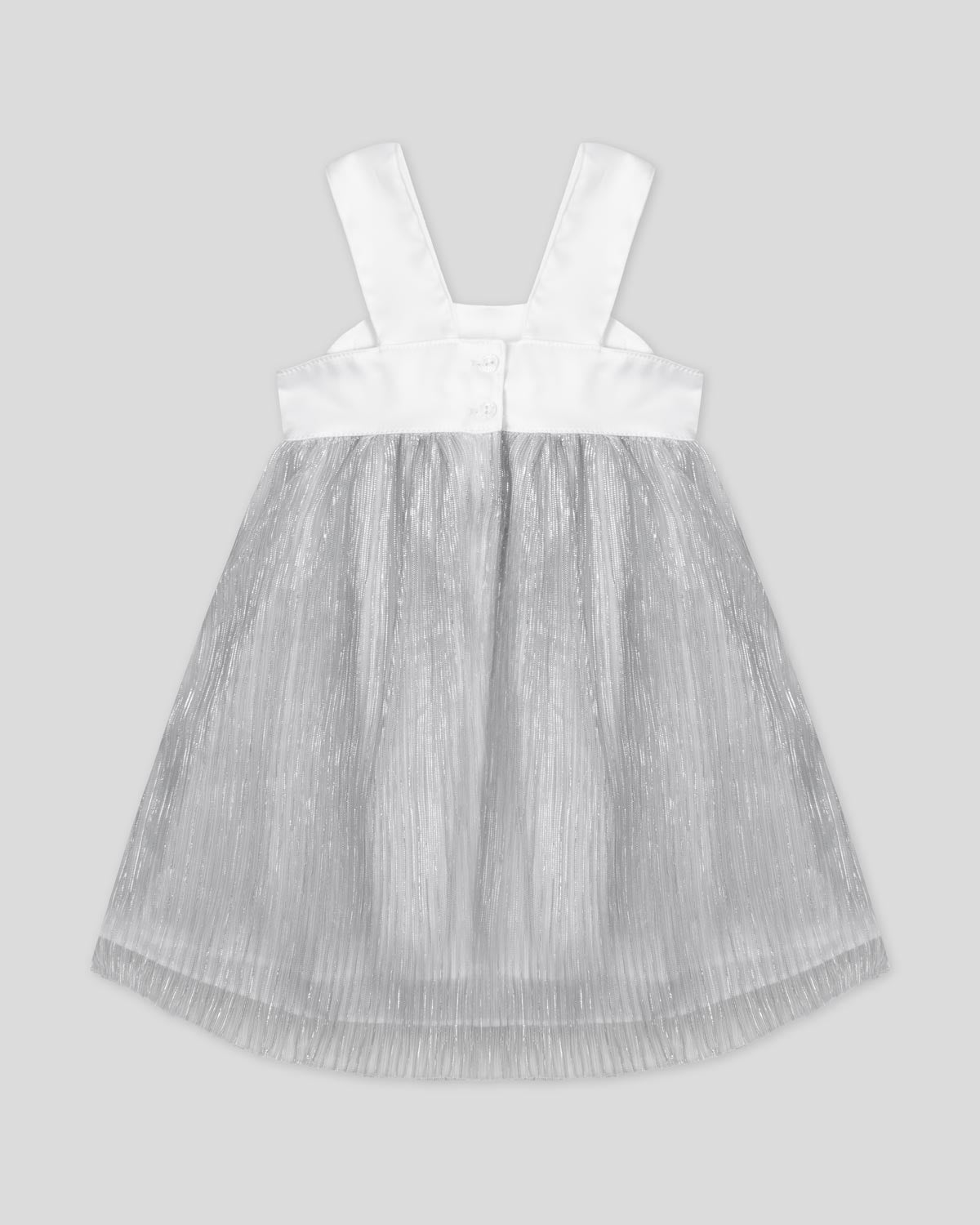 Vestido en satín blanco con moño y tull plisado con brillos plateados para niña