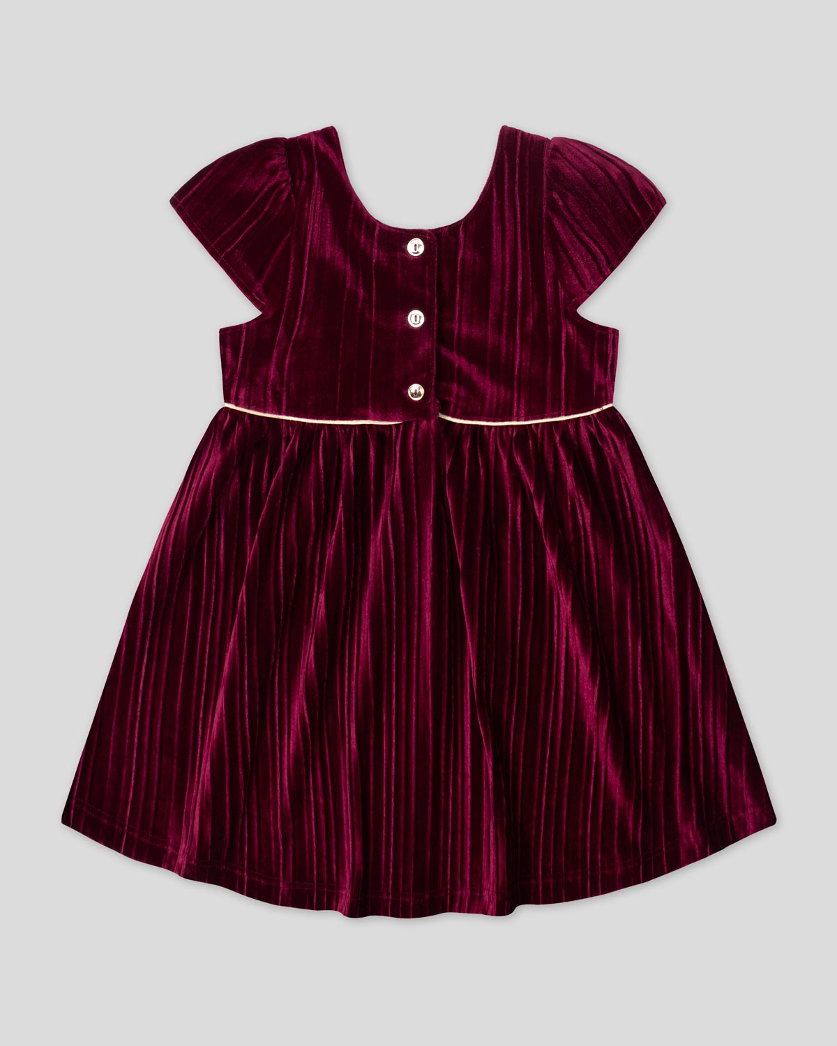 Vestido en velvet plisado vinotinto con botonadura en espalda para niña