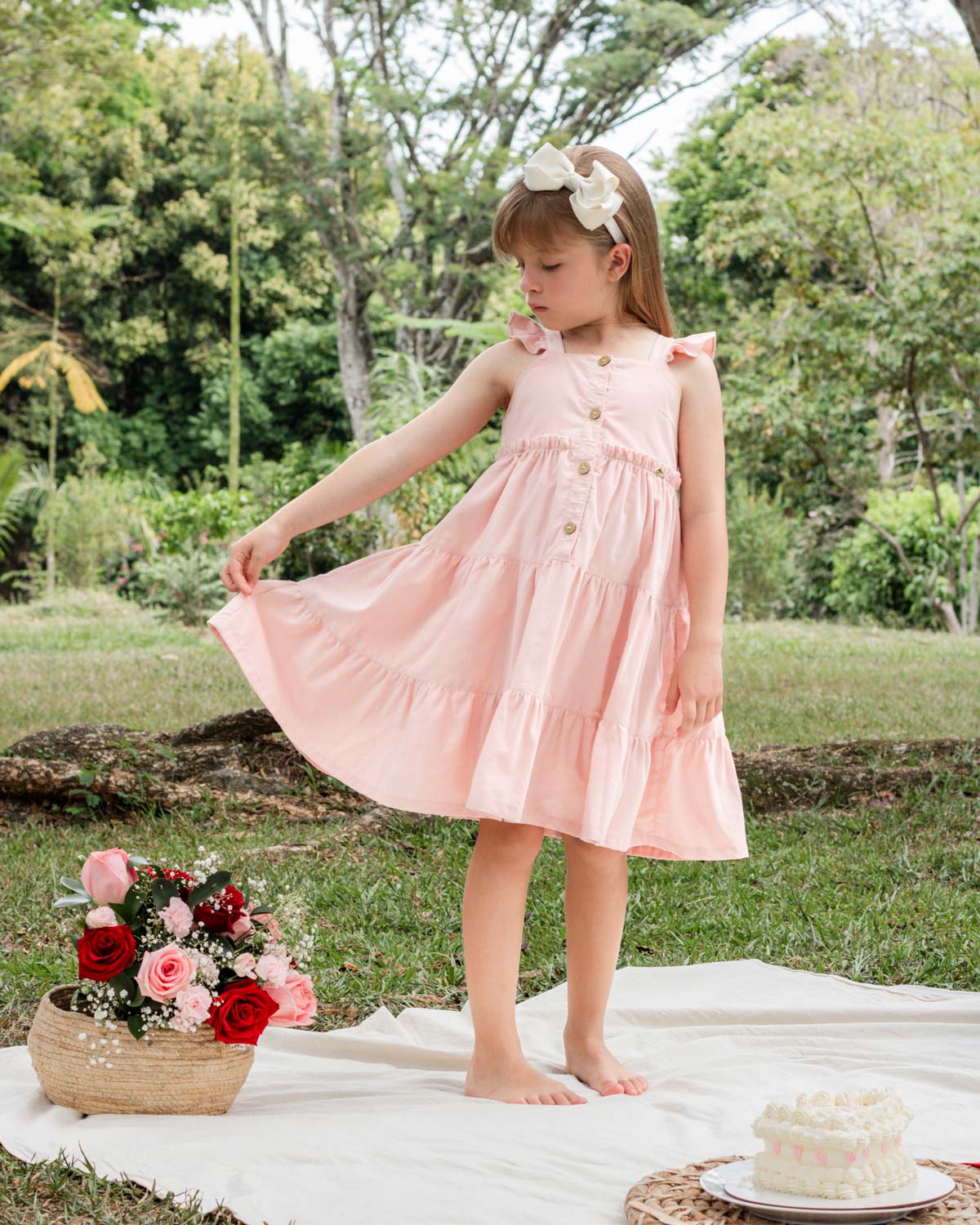 Vestido en corduroy de tiras con boleritos y botones para niña