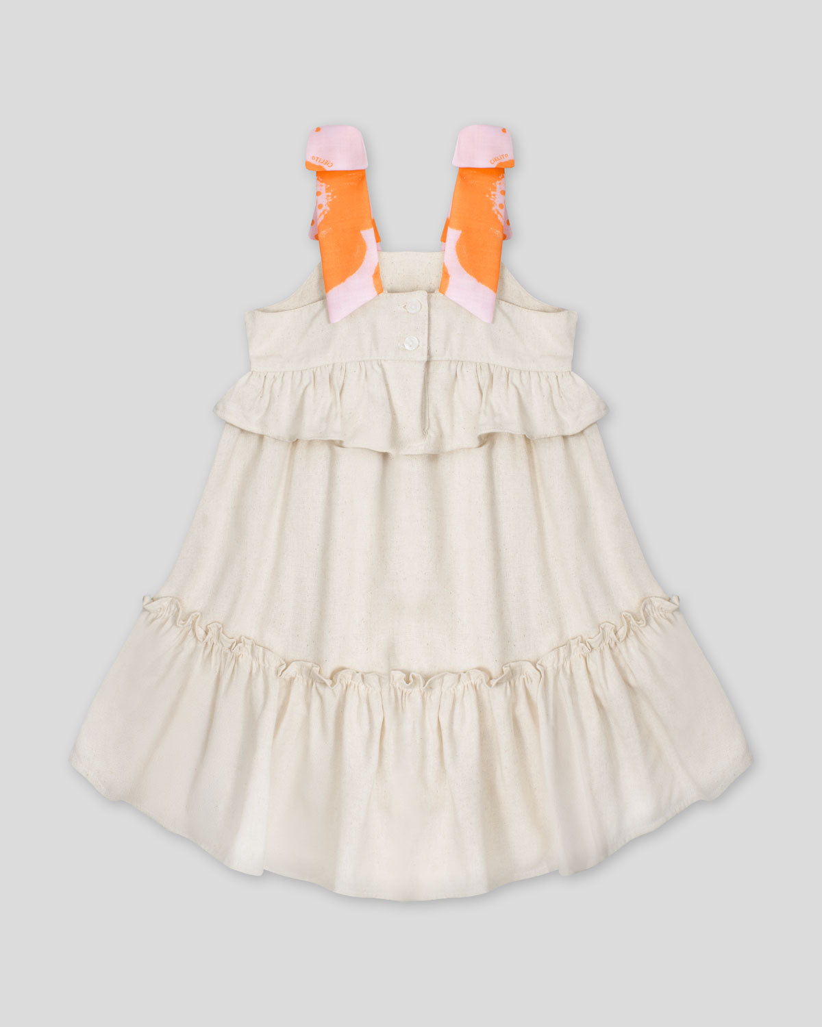 Vestido en lino de tiras con moños y boleros para niña