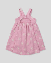 Vestido de tiras en lino rosado con flores y botonadura en espalda para niña