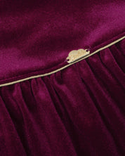 Vestido en velvet vinotinto con botonadura en espalda para niña