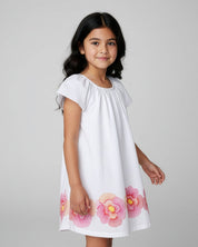Vestido en lino blanco con estampado de flores para niña