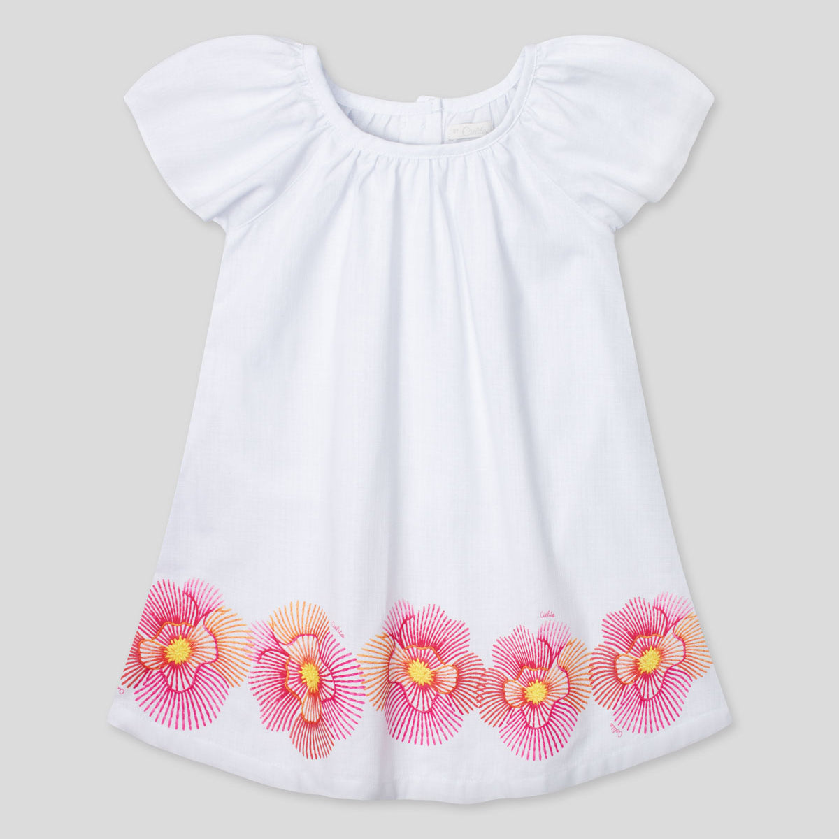 Vestido en lino blanco con estampado de flores para niña