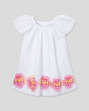 Vestido en lino blanco con estampado de flores para niña