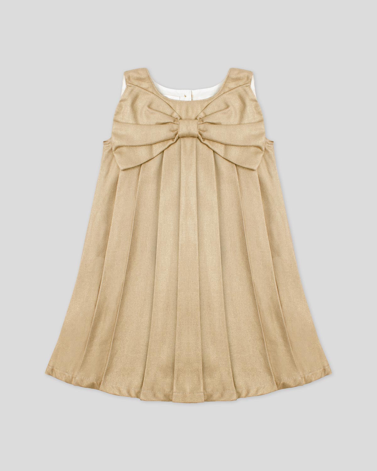 Vestido dorado en lino con brillos, moño y botones en espalda para niña