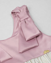 Vestido en satín de tiras con moños y plisado blanco crema para niña