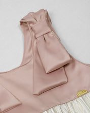Vestido en satín de tiras con moños y plisado blanco crema para niña