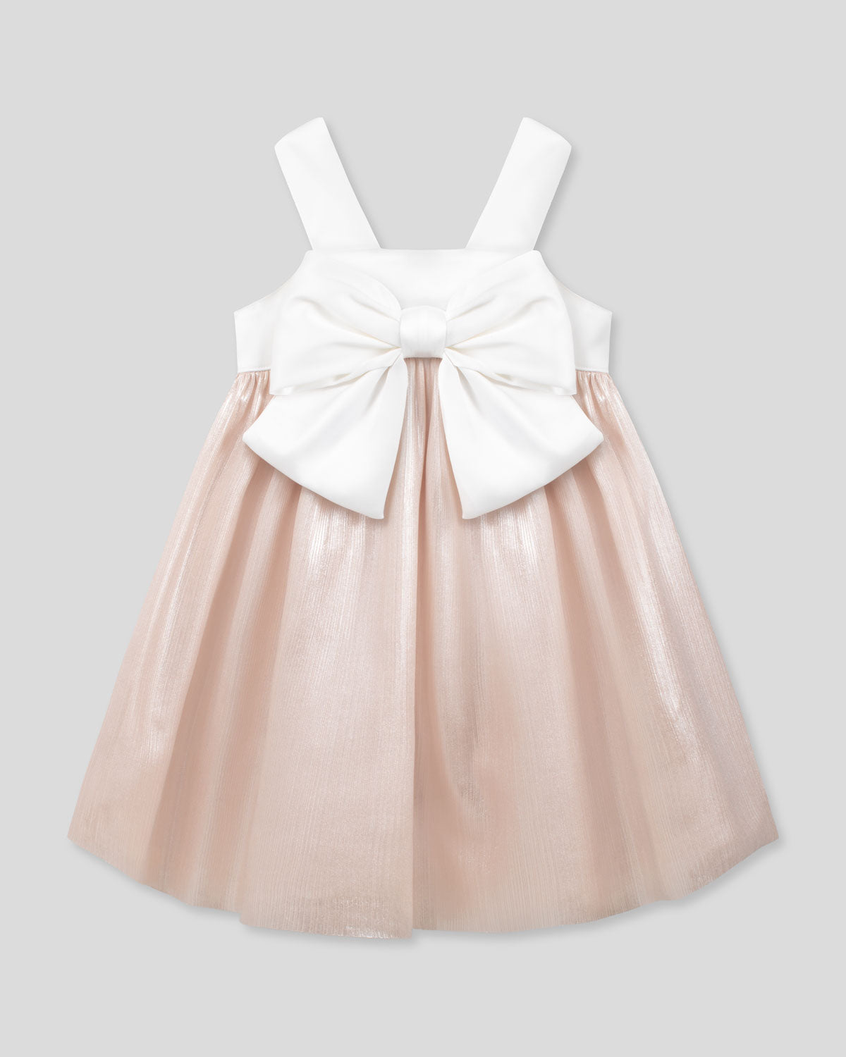Vestido en satín de tiras con moño y falda champán para niña